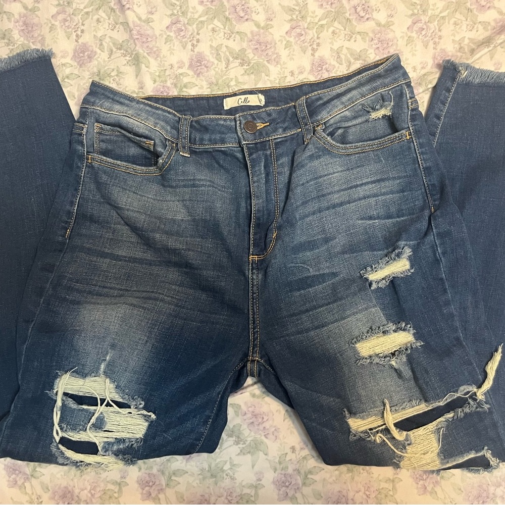 Navy blue distressed straight leg jeans